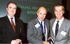 L-R: Rayner’s Managing Director, Donald J. Munro, UKISCRS President David Boase and David J. Apple.