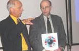 David Allen responds to a question with David Boase looking on.