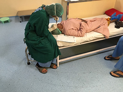 A patient receives the retro bullbar anesthesia